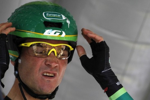 France's Thomas Voeckler adjusts his hel